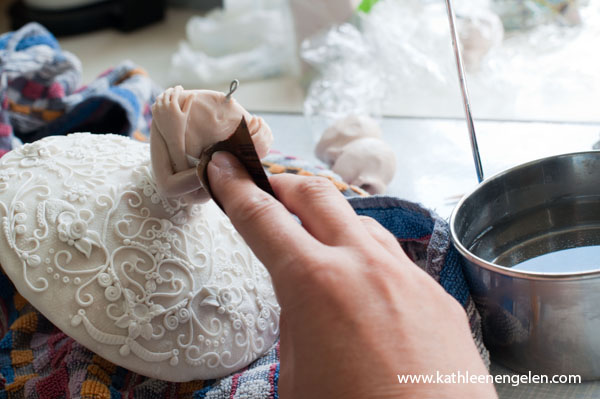 sanding the polymer sculpture